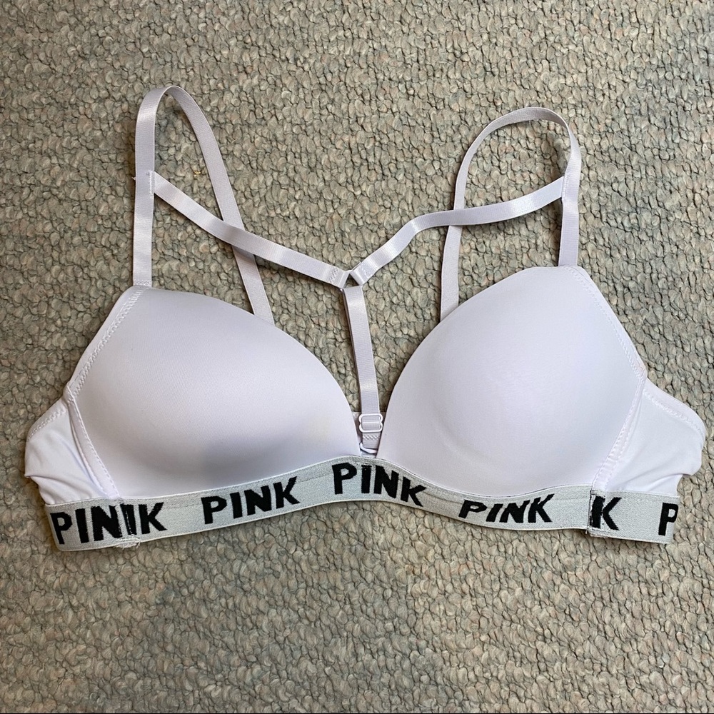 white pink sports bra with front chest strap